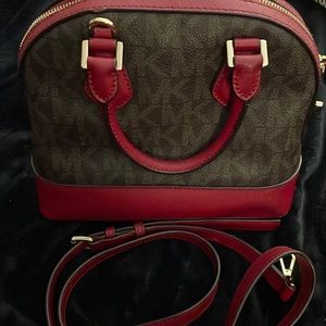 Michal Kors brown with maroon outline